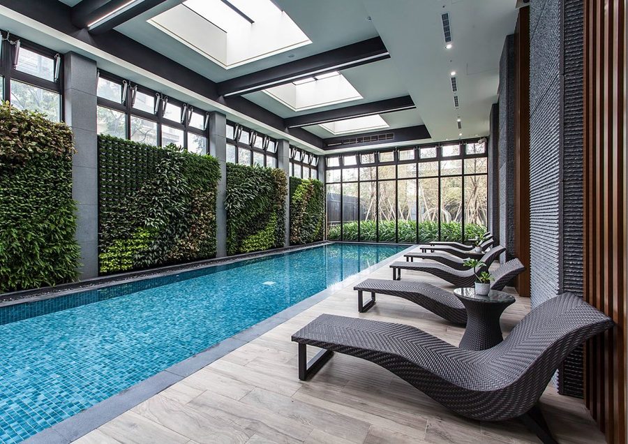 Da Guan Wu Ji — indoor lap pool with green wall