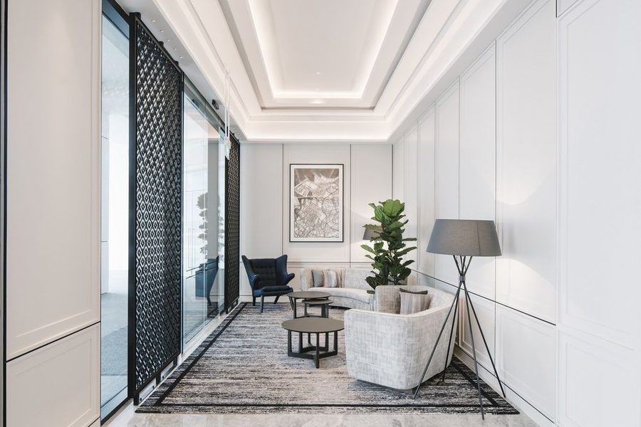 Grand Park City Hall — lounge nook with fretwork screen