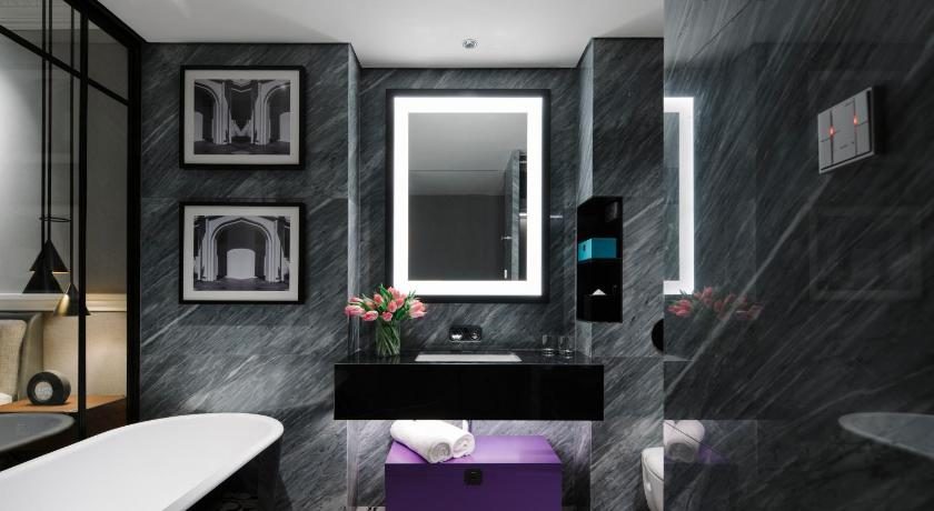 Grand Park City Hall — marble bathroom